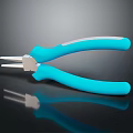 Blue Handle Pliers With Metal Jaws And Reflection On Black Surface