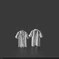 Two Plain White Shirts Hanging on Hangers Against Dark Blue Background