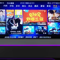 Modern KTV Room With Neon Lights Starry Ceiling Sofa TV Screen And Spacesuit Figure