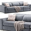 Modern Gray Sectional Sofa With Soft Pillows And Cozy Throw Blanket 3d model