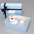 Blue Gift Box Set With Fresh Label Heart Shaped Item And White Packaging 3d model