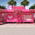 Pink Heart Shaped Outdoor Booth Decorated With Flowers Heart Cup Sign And Green Plants