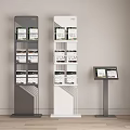 Modern Display Stands With Brochures And Small Podium In Room Interior 3d model