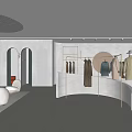 Modern Minimalist Clothing Store Interior With Clothing Racks Displayed Clothes And Decorative Mirrors