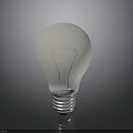 White Light Bulb With Metal Base Smooth Surface And Dark Background Reflection