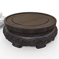 Dark Wood Round Wooden Stand with Carved Patterns and Traditional Design