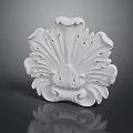 White Decorative Household Item With Intricate Carved Patterns And Floral Design