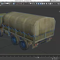 Green Military Cargo Truck With Canvas Covered Bed And Off Road Tires