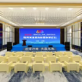 Elegant Conference Room Interior With Blue Screen Podium White Chairs And Chandelier