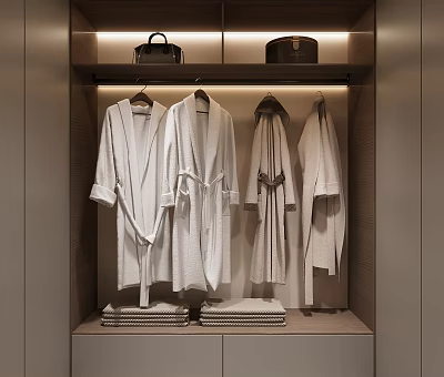 White Robes Hanging In Modern Wardrobe With Folded Towels And Leather Bags 3d model