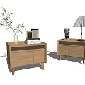 Modern Wooden Nightstands With Green Plant Books Lamp And Sculpture Decor