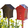 Public Facility Two Black And Red Mailboxes With Blue Patterned Awnings Surrounded By Yellow Flowers