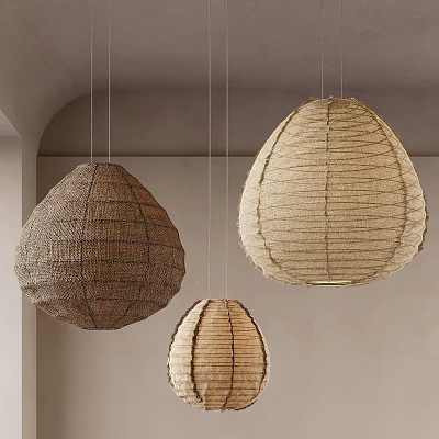 Three Teardrop Shaped Natural Woven Rattan Pendant Lights Hanging In Interior Space 3d model
