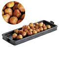 Fresh Ripe Pears Arranged on Two Black Ceramic Trays with Handles