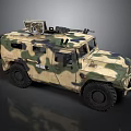 Camouflage Military Tank Featuring Top Mounted Weapon And Large Off Road Wheels