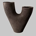 Artisanal Ceramic Vessels in Various Shapes with Textured Surfaces and Neutral Tones