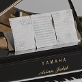 YAMAHA Piano With Sheet Music Placed On Top For Musical Practice And Learning