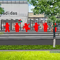 Red Bear Sculptures Dancing In Front Of Adidas Store With Balloons And Reflection