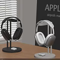 Apple AirPods Max Wireless Headphones With Black White Stand On Wooden Table