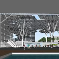 Modern Commercial Complex With Glass Roof And White Columns Pedestrians Walking In Open Public Space