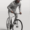Man In Gray Hoodie And White Pants Riding A Bicycle