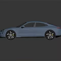 Blue Porsche Taycan Electric Sports Car With Sleek Design And Modern Look