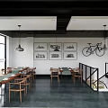 Open Space Café With Large Windows Wooden Tables Bicycle Decor And Green Plants