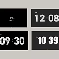 Four Black Modern TVs Showing Digital Time Display On Screens Against Gray Wall