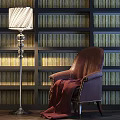 Comfortable Brown Leather Accent Chair with Red Blanket Against Bookshelf Wall and Vintage Floor Lamp