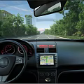 Car Interior With Steering Wheel Dashboard Navigation Screen And Road View Through Windshield