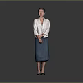 Woman in White Blazer and Blue Skirt Standing with Hands Crossed on Gray Background