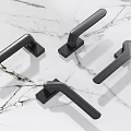 Black Modern Door Handles on White Marble Background with Sleek Contemporary Design