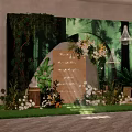 Forest Themed Photo Spot With Green Backdrop Floral Arch White Chandeliers And Green Plants