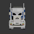 White And Blue Semi Truck With Green Covered Cargo Trailer And Colorful Cab Graphics