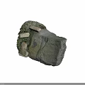 Ancient Stone Stela Surrounded By Small Stones And Grass In Historical Site