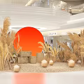 Stylish Shopping Mall Interior Decor With Red Circular Backdrop Golden Reeds Sofa And Ornaments