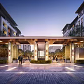Covered Residential Entrance With Evening Sky Stone Paved Path Greenery And Lighting