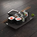 Fresh Delicious Sushi Rolls Served On Black Plate With Chopsticks Soy Sauce And Wasabi