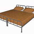 Silver Metal Frame Double Bed With Brown Bedspread Pillows And White Mattress