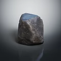 Decorative Ornament Set With Textured Stone Piece Gray Blue Hue Dark Background And Reflection