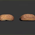 Freshly Baked Golden Brown Bread Loaves With Crispy Crust On Dark Surface