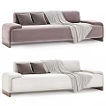 Modern Beige and Purple Three-Seater Sofa with Gray Pillows and Cozy Blanket