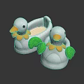 White Ducks Toy Decorations With Yellow Beaks And Green Wings On Dark Background