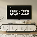 Modern TV Stand With White Circular Cabinet Doors And Decorative Items By Green Plant