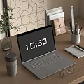 Open Laptop on Wooden Desk with Coffee Cup Green Plant Eyeglasses Notebook and Pen