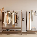 Wooden Clothes Racks With Light Colored Clothes Dresses Shirts Scarf And Bags On Wooden Floor