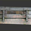 Ancient Stone Building Structure With Colorful Brick Paving And Moss Covered Edges