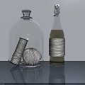Transparent Glass Dome Wine Bottles With Spool Yarn Ball And Twine Wrapped Design On Table