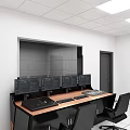 Contemporary Workspace With Long Desk Multiple Monitors Black Chairs White Walls And Glass Partition