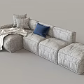Gray Sectional Sofa with Multiple Cushions Blue Throw Pillow and Light Colored Blanket